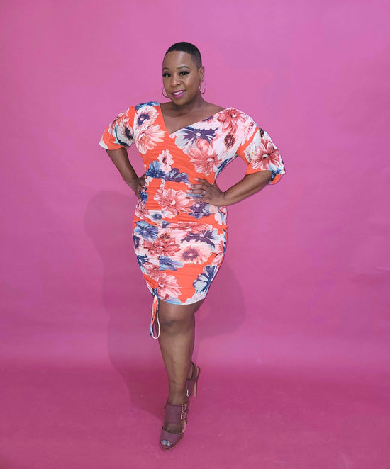 Plus size bodycon flower pattern dress with drawstring in the front. 